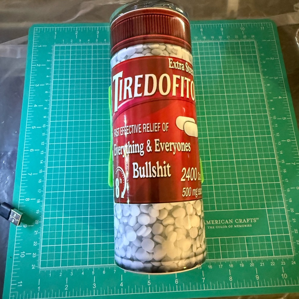 Red and White Tiredofit Bottle